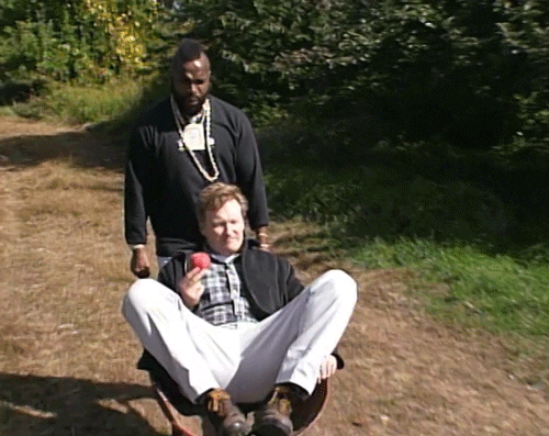 Mr T Pushing Conan Obrien In Wheelbarrow GIF