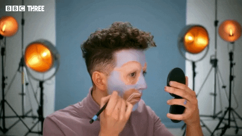 Mua Applies Foundation On Face GIF