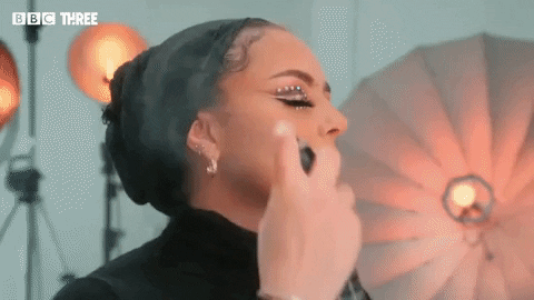 Mua Sprays Face With Setting Spray GIF