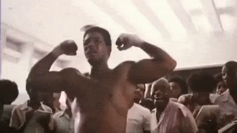 Muhammad Ali Flexing Muscles GIF