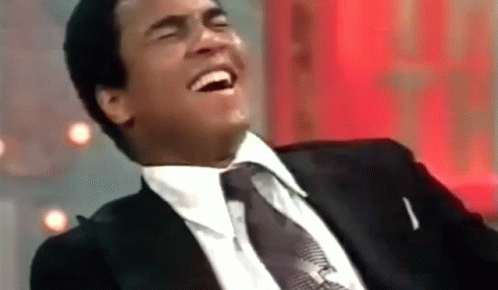 Muhammad Ali Laughing Hard GIF