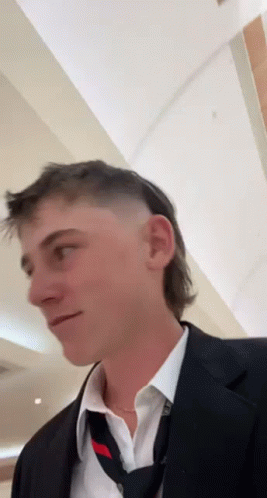 Mullet Haired Boy In Mall GIF