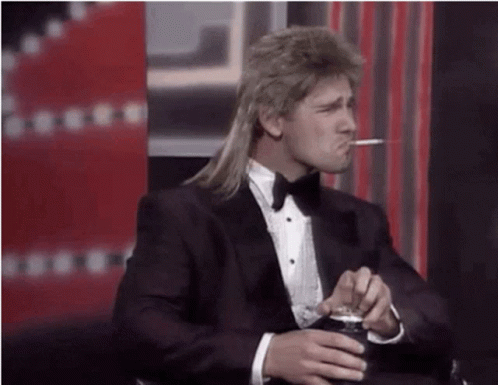 Mullet Haired Eric Bana Smoking GIF