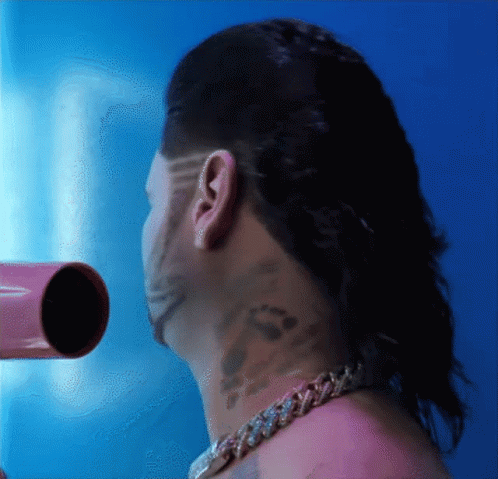 Man With Tattoos Bow Drying Mullet GIF