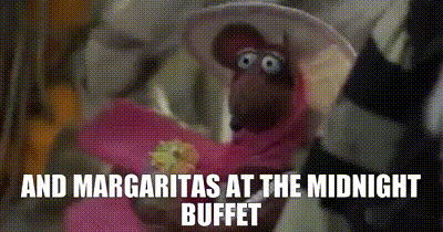 Muppet Wearing Hat and Flower