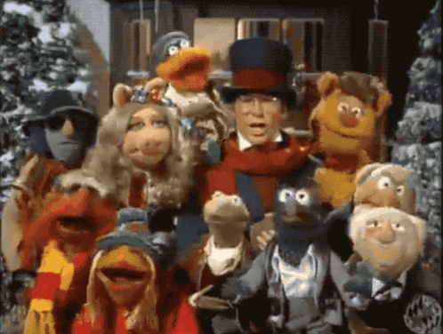 Muppets Posing With Man in Top Hat