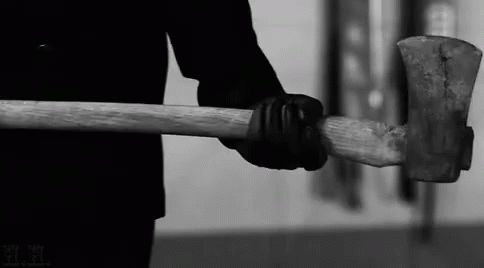 Murder Wielding An Axe Monochromatic GIF