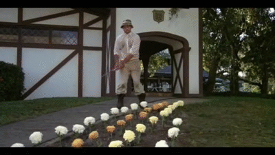 Murray Hitting Flowers With Golf Clubs In Caddyshack GIF