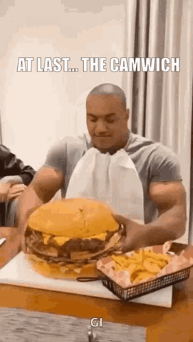 Muscular Man Eating Giant Hamburger and French Fries
