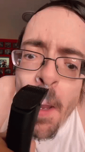 Weird Guy Trimming Mustache GIF