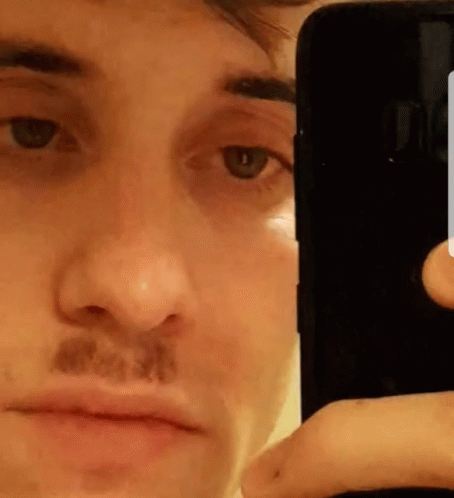 Funny Man Donning Hitler Mustache GIF