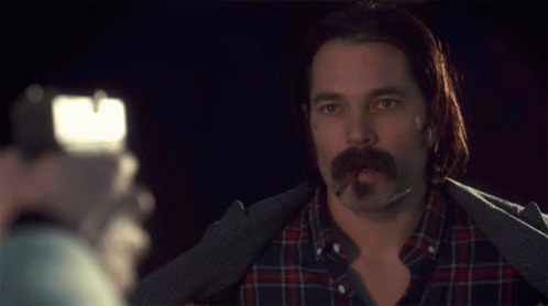 Mustached Guy Doc Holliday Smoking Tobacco GIF