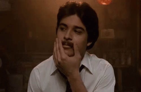 Guy Rubbing Old Style Mustache GIF
