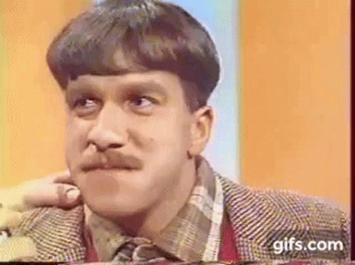 Mustached Man Funny Face in Suit and Plaid Shirt