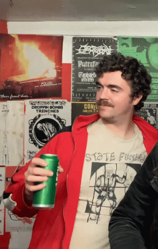 Mustached Man Holding Green Can Skate Funk Shirt GIF