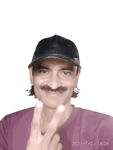 Mustached Man in Hat and Purple Shirt Peace Sign