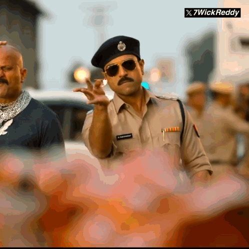 Mustached Man in Sunglasses and Beret With Wick Reddy