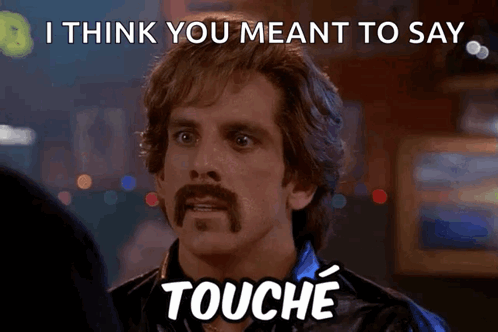 Mustached Man Saying I Think You Meant To Say Touche
