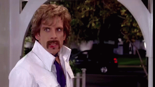 Mustached Man White Shirt and Tie at Arch
