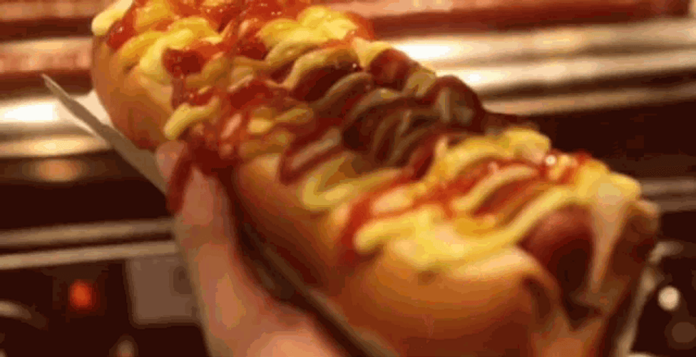 Mustard And Ketchup In Hot Dog GIF