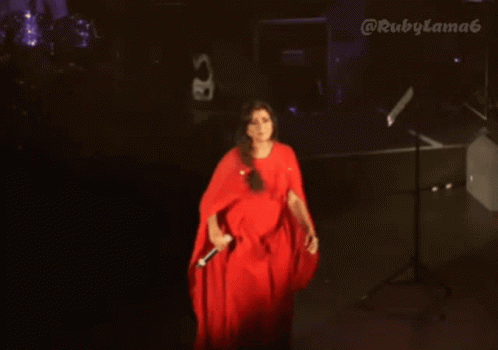 Lady In Red Dress Doing My Pleasure Bow GIF