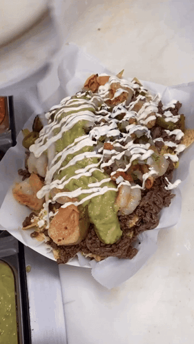 Nachos With Guacamole and Sour Cream