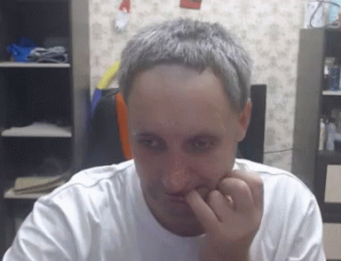 Happy Man Nail Biter GIF