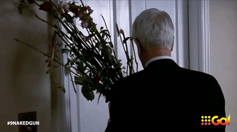 Naked Gun Frank Drebin Riding Elevator GIF