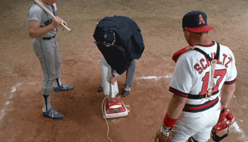 Naked Gun Frank Drebin Vacuuming Baseball Base GIF