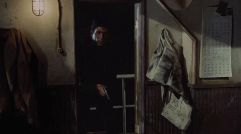 Naked Gun Officer Nordberg Confronting Armed Group GIF