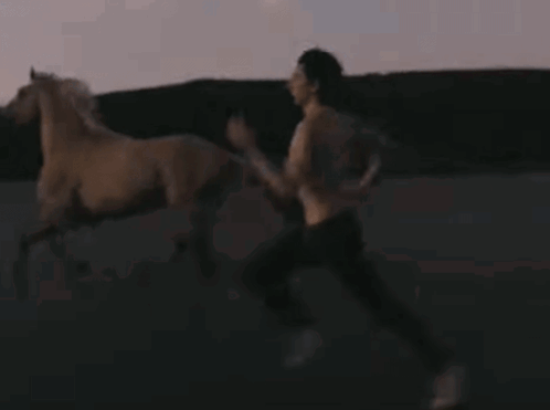 Naked Man Running on Beach at Sunset
