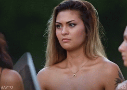 Naked Woman With Horseshoe Necklace Beside Two Naked Women