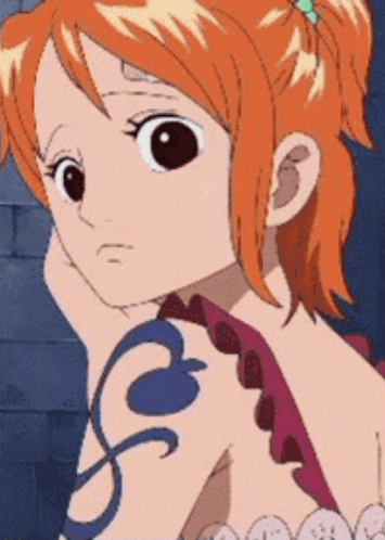 Nami From One Piece Has A Tattoo On Her Back GIF