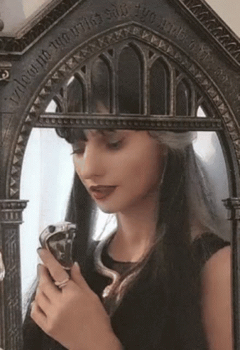 Narcissa Malfoy Touching Snake Staff On Mirror GIF