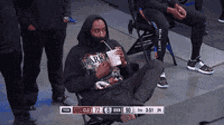 Nba Basketball Player James Harden Drinking And Watching Basketball Game GIF