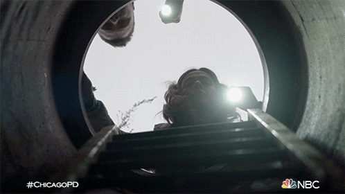 NBC Ad for ChicagoPD Man Looking Out of Hole