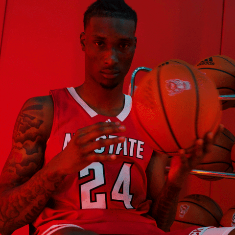 Nc State Basketball Guy Holding Jersey And Ball GIF