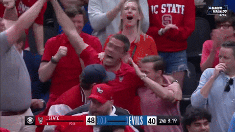 Nc State Fan Group Hug Each Other GIF