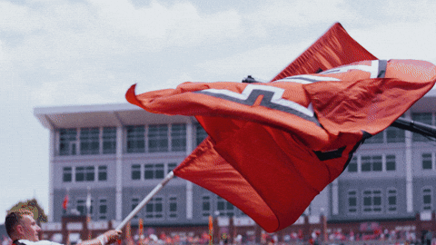 Nc State Flag Waved In Front Of Everyone GIF