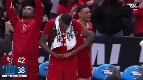 Nc State Player Gesturing Like Holding Baby GIF