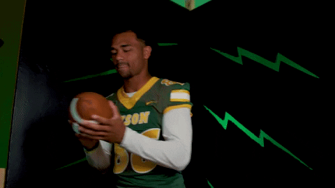 Ndsu Football Player Holding Oval Shaped Ball GIF