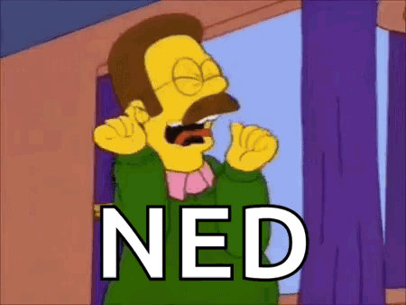 Ned From The Simpsons Is Making A Funny Face While Talking On A Cell Phone . GIF