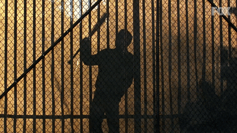 Negan Knocking On Fence GIF