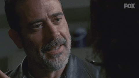 Negan Stares And Smiles GIF