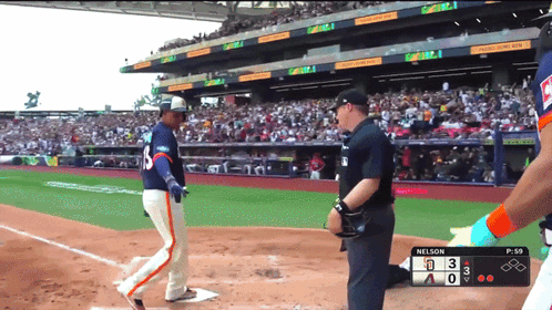 Nelson Batting at Baseball Game