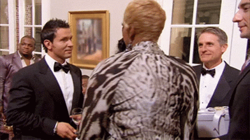 Nene Leakes Turning Back Tiger Print Dress GIF