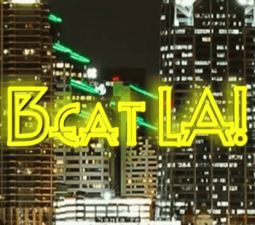 Neon Sign Saying Beat LA City Skyline