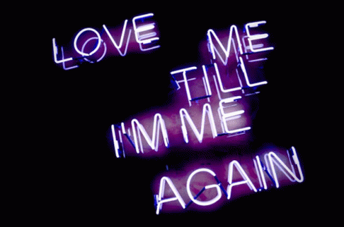 Neon Sign Saying Love Me Till I'm Me Again
