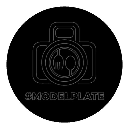 Neon Sign Says Modelplate in Yellow