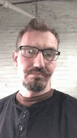 Nerd Bearded Guy Eye Brow Raise GIF